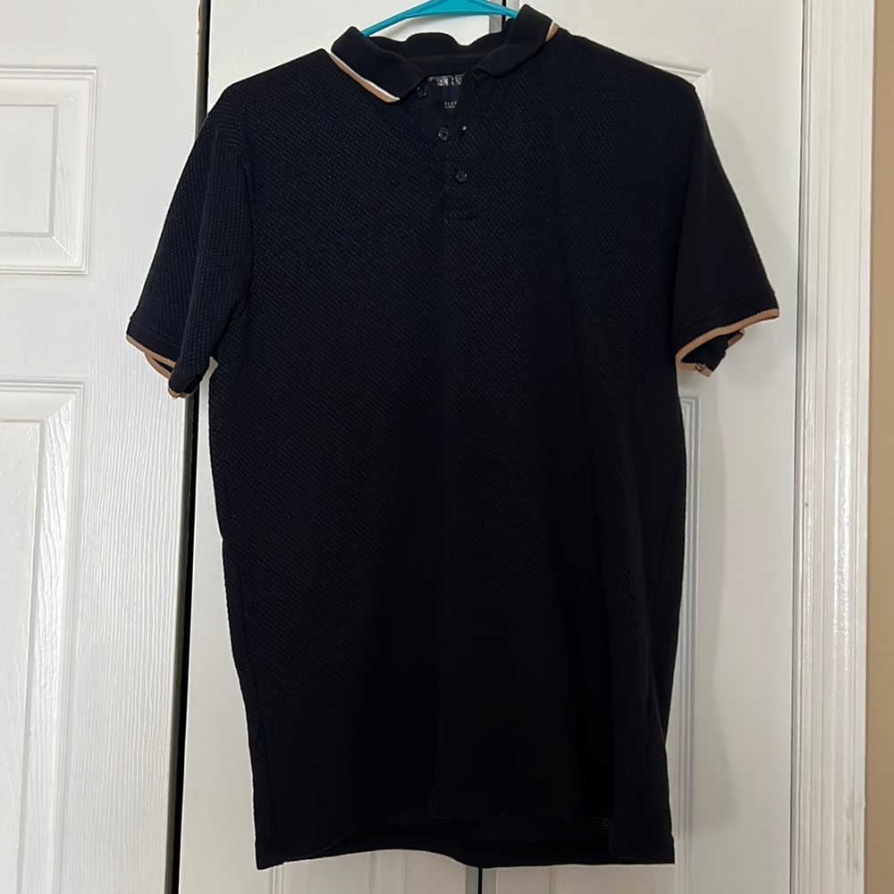 Denim and flower shirt, beautiful navy blue with brow outlines on the sleeves.